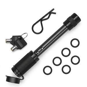 Locking hitch pin fitted through a tow bar receiver